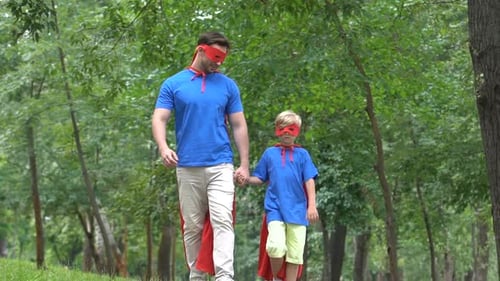 Father and Son Superhero Walk in Green Park