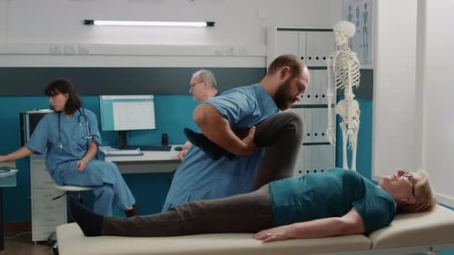 Senior Woman Receives Physical Therapy Leg Treatment