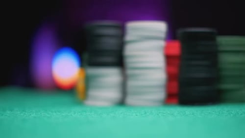 Disc Rotates in the Air Casino Chips on Green Felt