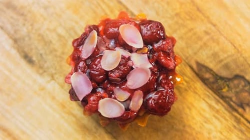 Berry Tart Close-Up with Almonds on Wood