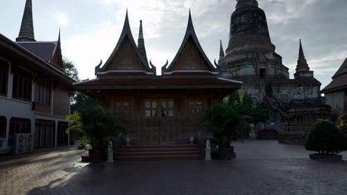 Tourist Walking POV at Wat Yai Chai Mongkhon Temple at Sunset in Ayutthaya Thailand