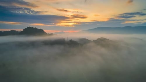 Hazy Mountain Landscape at Sunrise Aerial