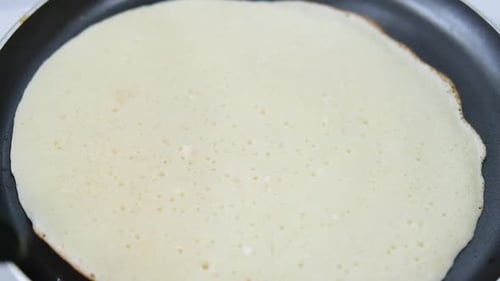 Pancake Cooking in a Hot Pan