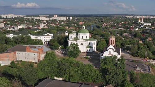 Beautiful flight over the city in summer. Churches, old houses, university.