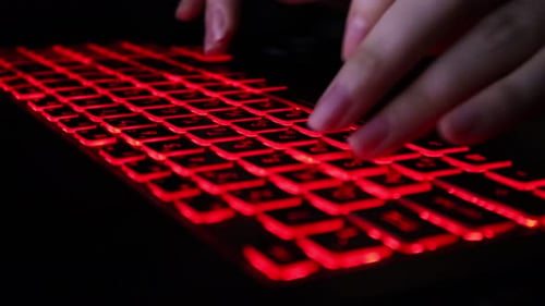Typing on Red Backlit Keyboard in the Dark