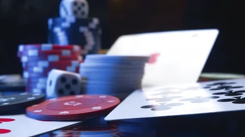 Casino Chips and Playing Cards in Motion