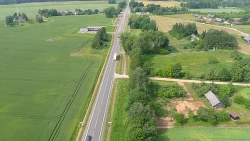 car on an asphalt rural road with a beautiful landscape. footage 4K. Drone clips on the Highway in L