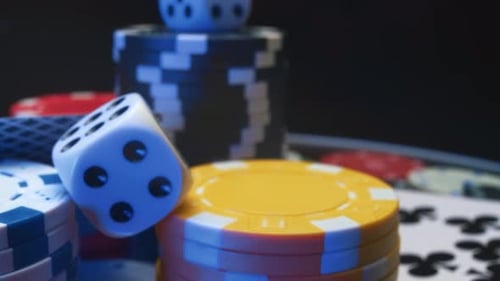 Casino Chips and Playing Cards in Motion