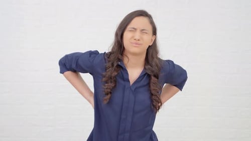Indian girl having back pain