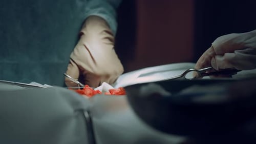 Closeup Surgeon Hands Stitching Wound After Successful Operation in Clinic
