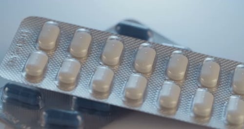 Macro Shot of Blue and White Pills