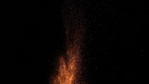 Fiery Particle Explosion Rising Upward on Black