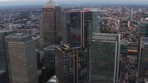 Ascending Footage of Top Part of South Quay Plaza Building