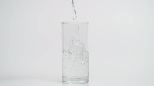 Glass Being Filled With Refreshing Water
