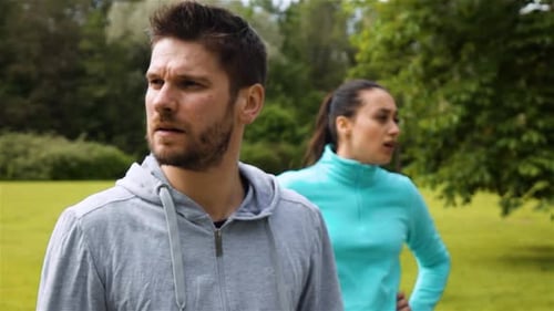 Man and Woman Workout in the Park