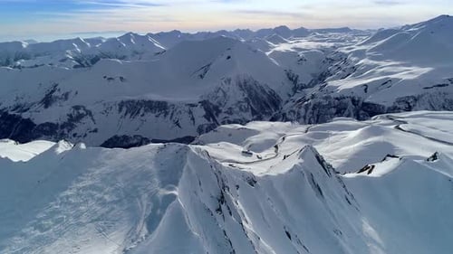 Aerial View of Snowy Majestic Mountain Range