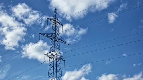 High Voltage Tower with Cloudy Sky Background, Power Line, Time Lapse