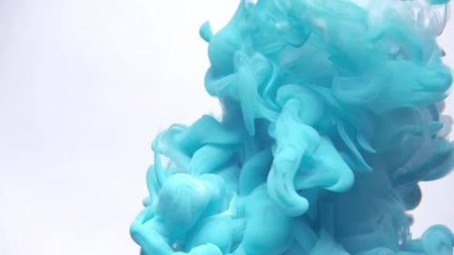 Abstract Blue and White Ink Swirling in Water