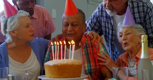Seniors Celebrate Birthday with Cake and Friends