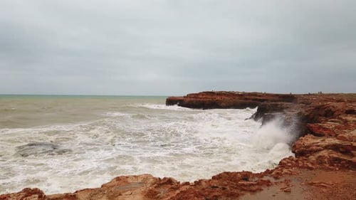 Splashes of Water From the Waves Breaking on the Stones, Storm Sea with Waves Crashing Against the