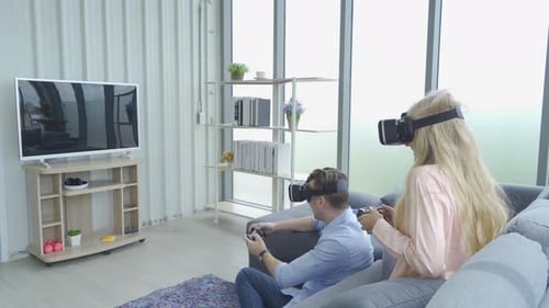 Couple Enjoys VR Gaming at Home
