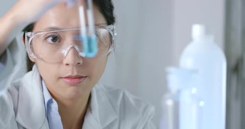 Woman Scientist Working in Laboratory