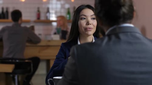 Business Meeting at a Restaurant