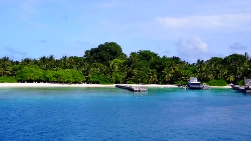 Drone panorama of island beach journey by blue ocean and sand background