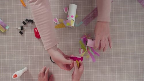 Flat lay. Step by step. Making unicorns out of paper and empty toilet paper rolls.