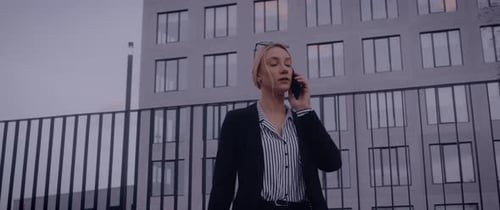 Business Woman Talking on Phone in City
