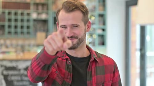Happy Man Points at Camera, Close Up