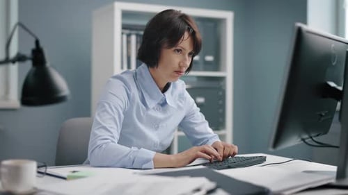 Angry Woman Hitting Office Desk