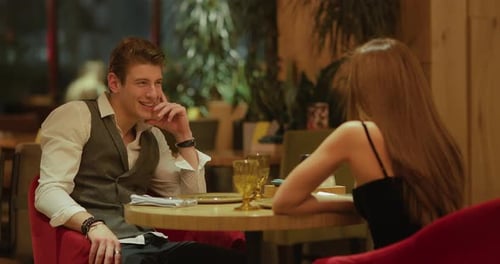 Date Guy with a Girl in a Cafe