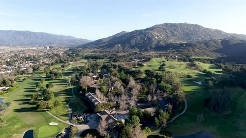 Aerial View of Golf Course with Green Field in the Valley