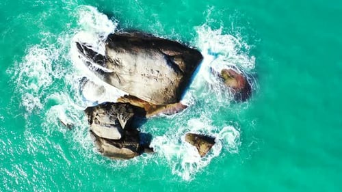 Aerial above seascape of relaxing resort beach vacation by shallow sea and white sand background of