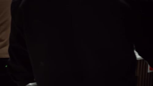 Child Getting Haircut in Barber Shop