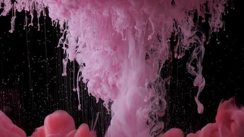 Tinta rosa e vermelha na água - fundo abstrato de arte