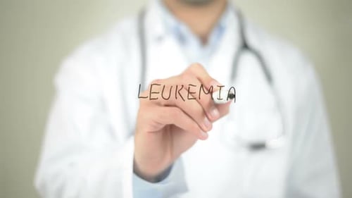 Doctor Writes the Word Leukemia on Screen