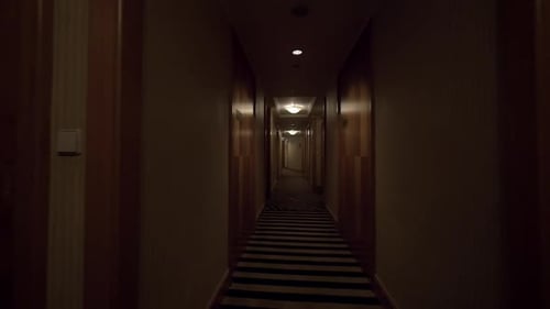 Walking through the hotel corridor