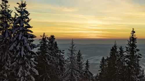Sundown Time Lapse in Winter Mountain