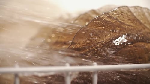 Ice Cream Bonbons Being Sprayed with Water