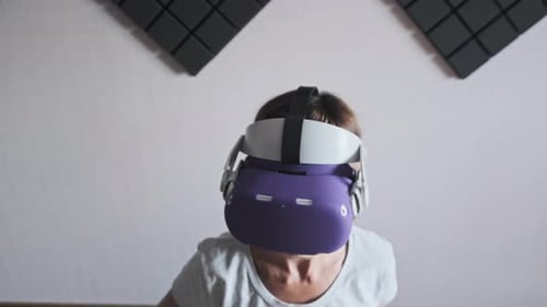 Adult Woman Immersed in Virtual Reality Headset