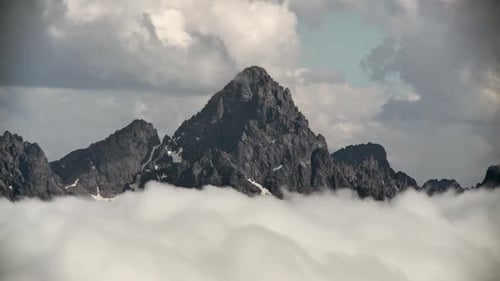 8K Andes Mountain Peak Above The Clouds