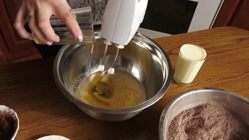 Woman Mixing Ingredients for Baking Dessert