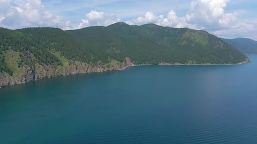 Flight Over the Rocky Shore of Lake