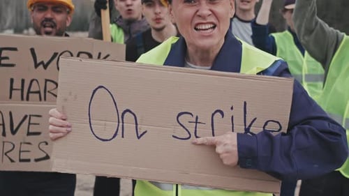 Group of Adults Protest and Strike Outdoors