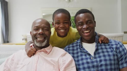 Three Generations of a Happy Family Smiling