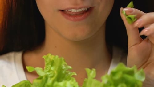 Close-up Woman Eating Leafy Greens, Healthy Diet Concept
