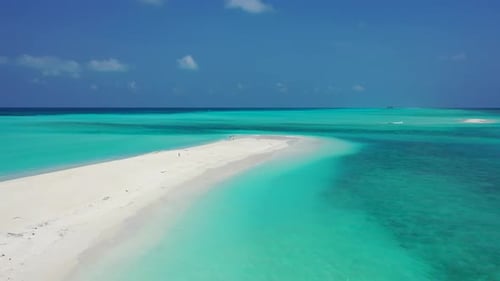 Aerial drone seascape of paradise resort beach time by turquoise lagoon with white sand background o