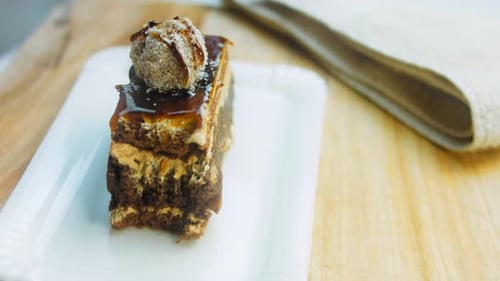 Piece of Decadent Cake Cut with a Gold Fork